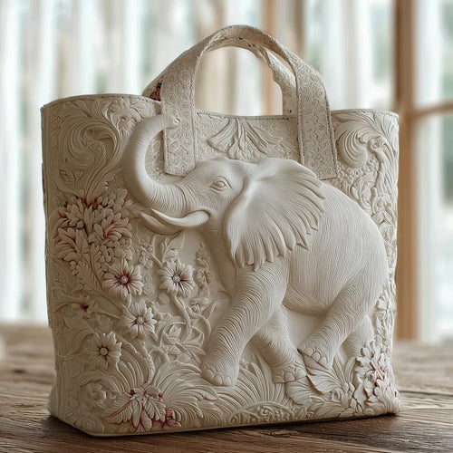 Artisan quilted tote bag with an elephant in profile, ears spread wide and hide shaded in soft greys