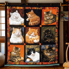 Sleeping Cat Squares quilted throw – sleeping cats in black-framed squares