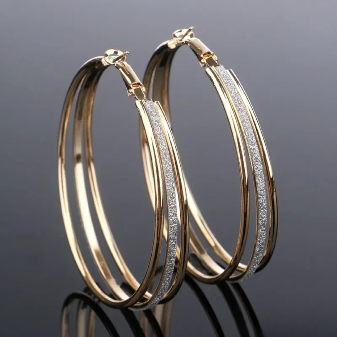 Large gold-tone triple oval hoop earrings