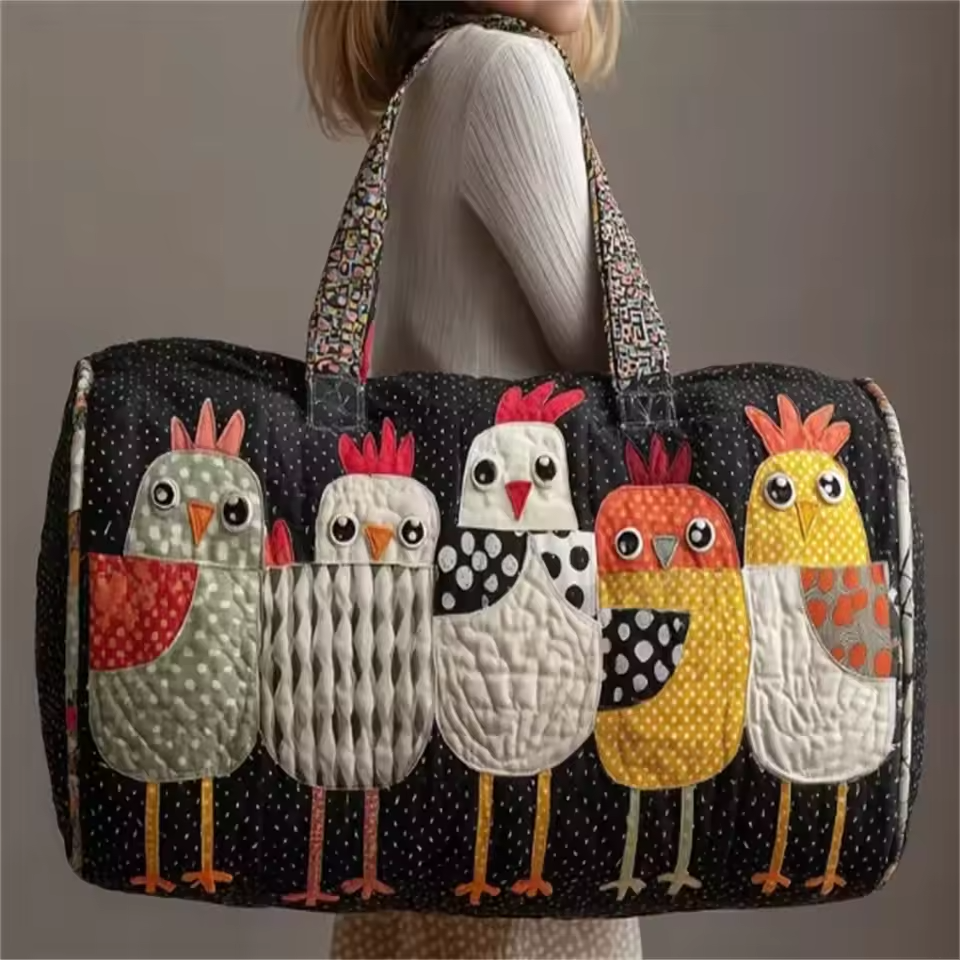 Colleen soft quilted travel bag in the wave-stitch pattern, the smaller size shown from the front