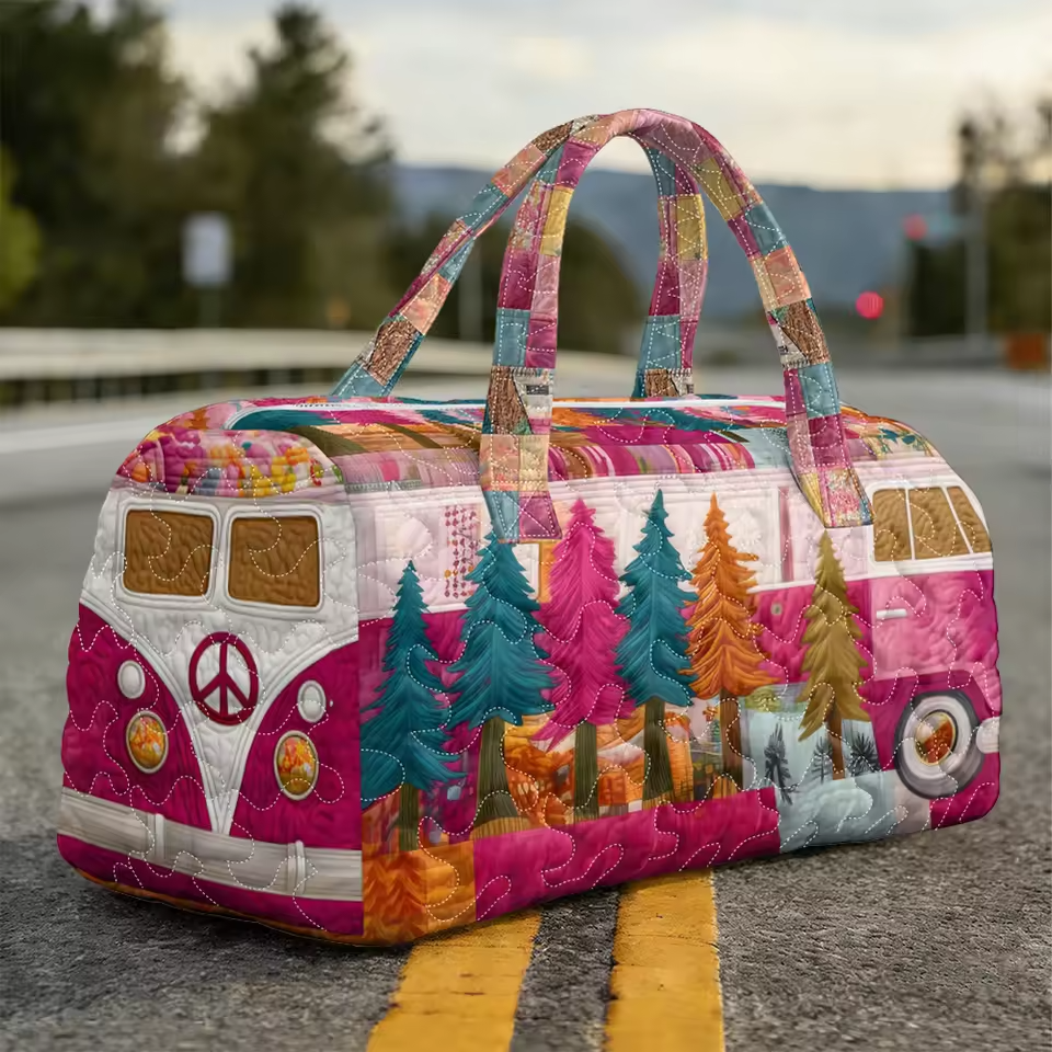 Clementine soft quilted travel bag in the wave-stitch pattern, shown flat
