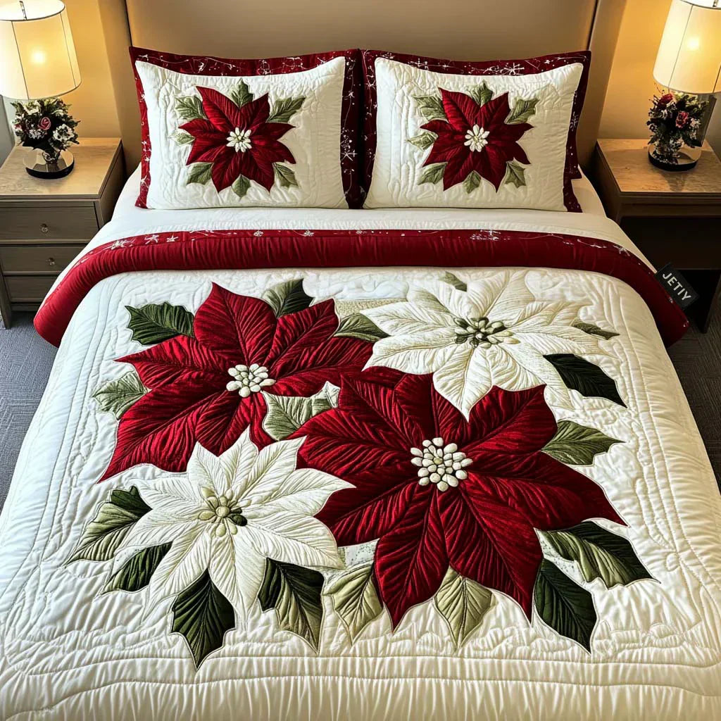Quilted bedspread set with frosted poinsettias, pine sprigs and berries on deep green in the Winter Poinsettia design