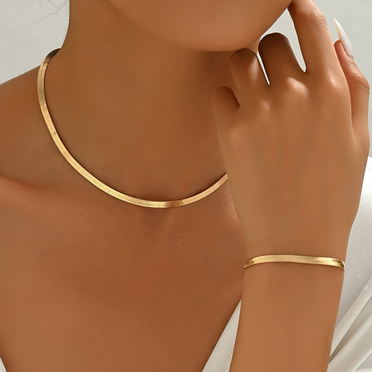 Gold-tone herringbone necklace and bracelet set