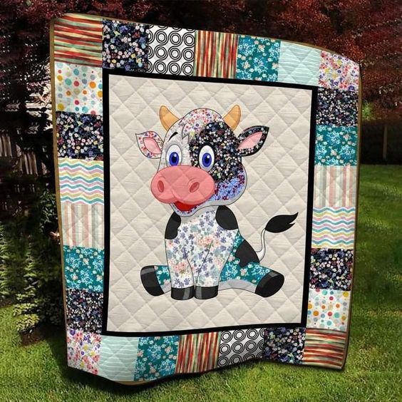 Floral Cow quilted throw – sweet floral cow in a patchwork frame