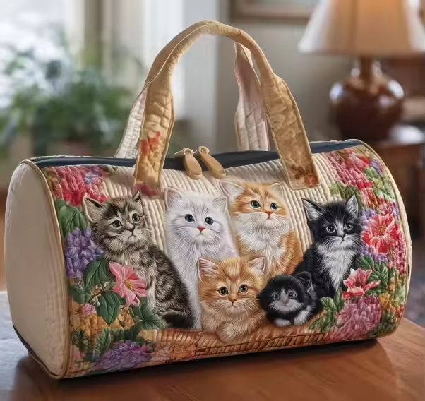 Alice soft quilted travel bag in the wave-stitch pattern, the smaller size