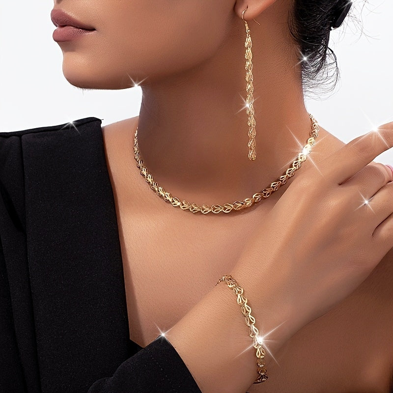 Gold-tone leaf chain necklace, bracelet and earrings set