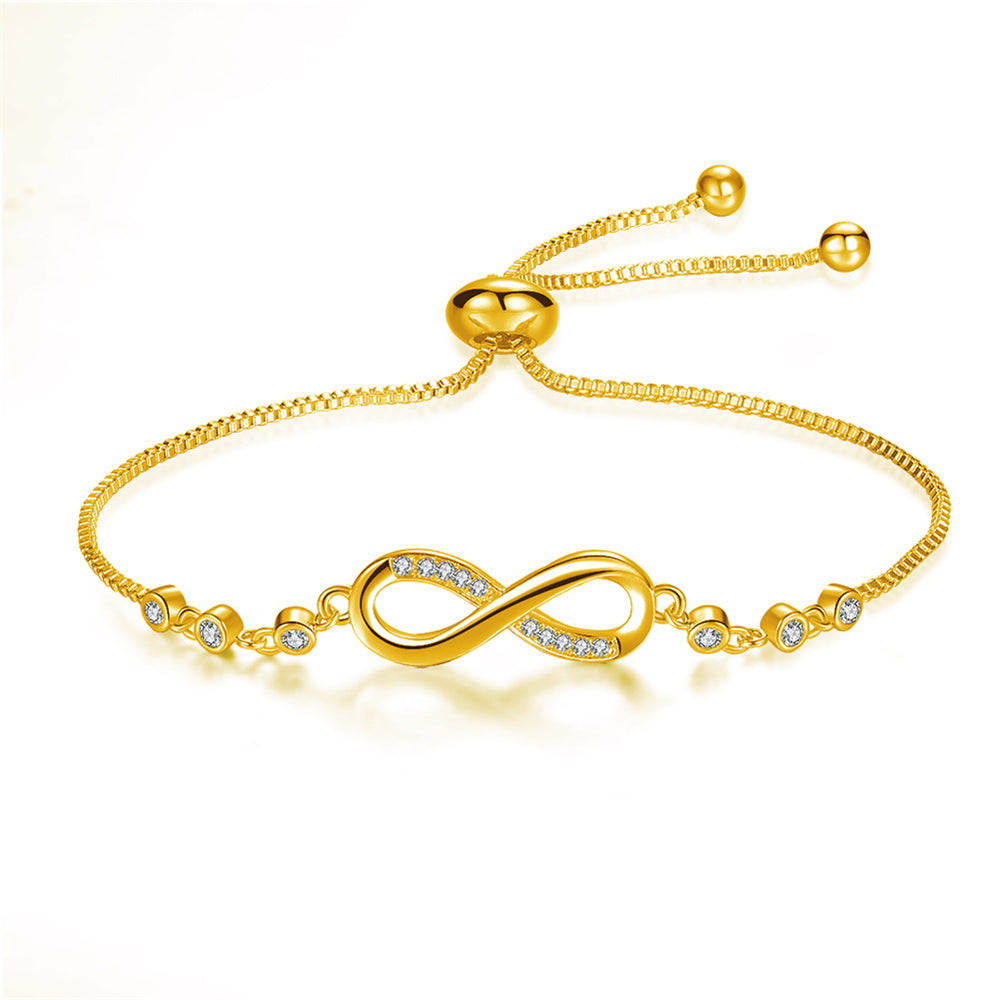 Gold-tone crystal infinity bracelet with slider