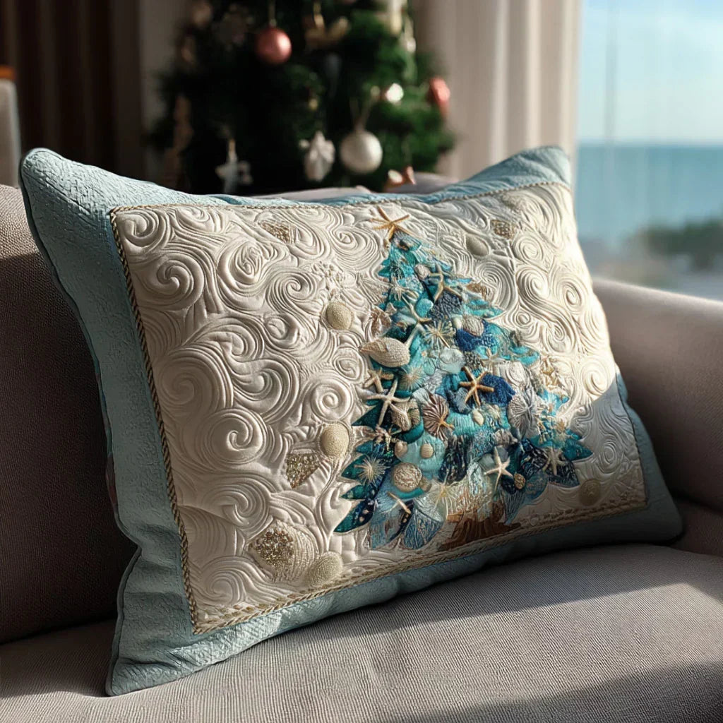 Quilted pillowcase with the Aqua Christmas Glow design, baubles, stars and winter greenery in aqua, teal and soft silver over wave-stitch quilting