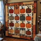 Pumpkin Patchwork quilted throw – pumpkins in neat patchwork squares
