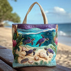 Artisan quilted tote bag with a still lagoon scene in blues and greens, broken light on the water and reeds at the edge