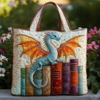 Artisan quilted tote bag with an emerald dragon curled around a stack of old books, scales in deep green and gold