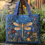 Artisan quilted tote bag with the Golden Dragonfly design, a single golden dragonfly with finely veined wings on deep teal.