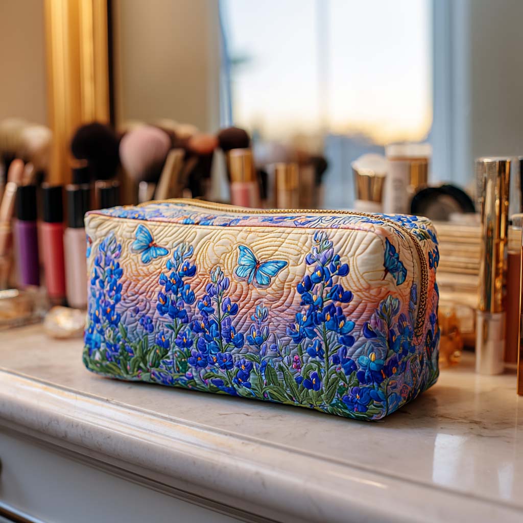 Quilted make-up bag with the Blue Butterfly design of blue butterflies drifting over tall spires of lupins in deep indigo and cornflower