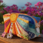 Quilted make-up bag with the Boho Rays design of retro sunburst rays, daisies and small toadstools in amber, rust and cream