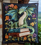 Dragon in the Garden quilted throw – green dragon on books among flowers