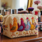 Chicken Joy quilted make-up bag with row of ginger, purple and blue hens on cream