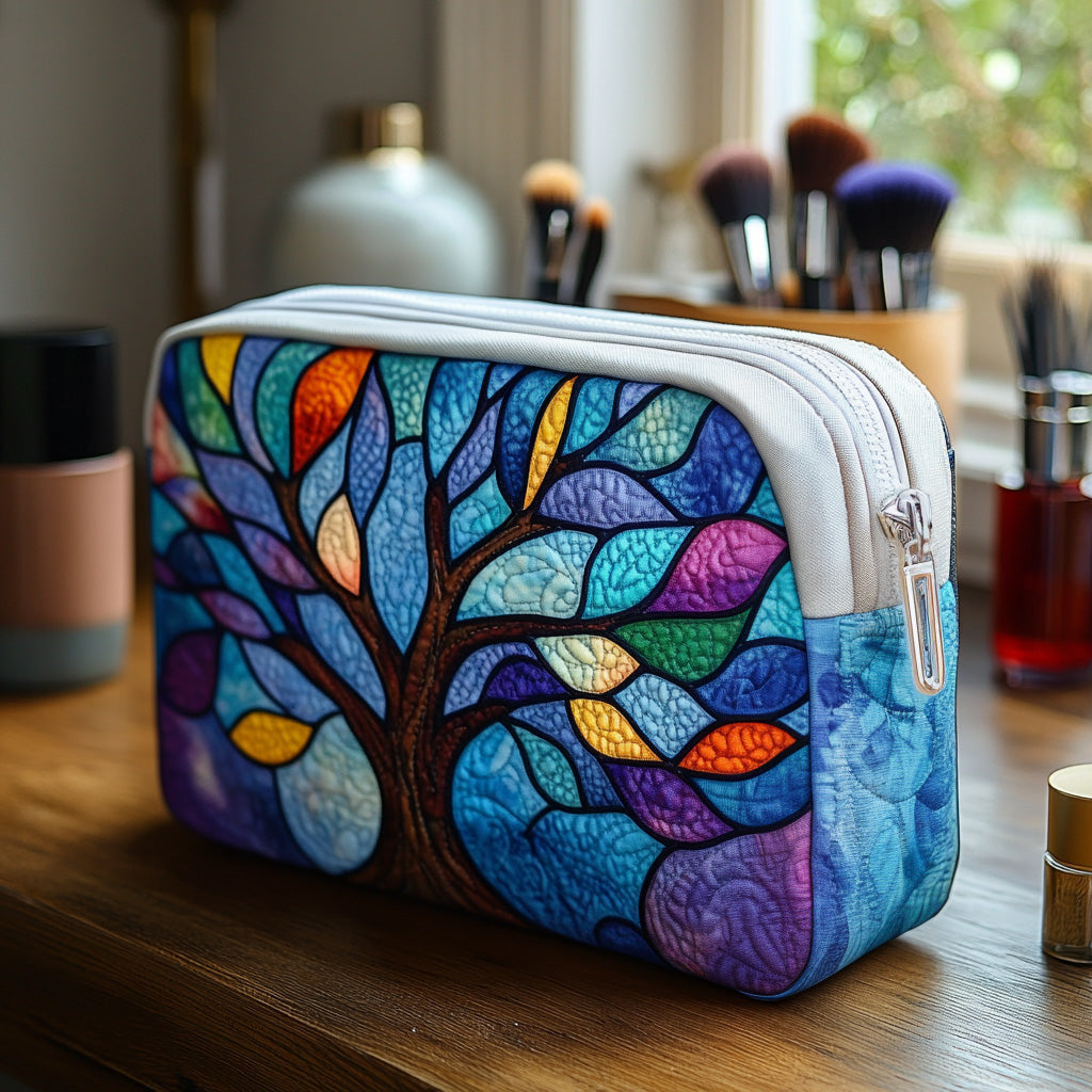 Circle of Roots quilted make-up bag with stained-glass tree of life in blues, purples and greens