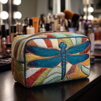 Colourful Dragonfly quilted make-up bag with blue dragonfly over rainbow patchwork rays
