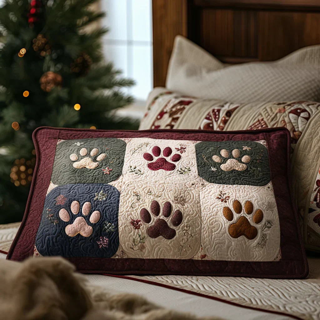 Quilted pillowcase with the Cosy Paws design, rounded paw prints in warm neutral tones set like tracks across the wave-stitch quilted front