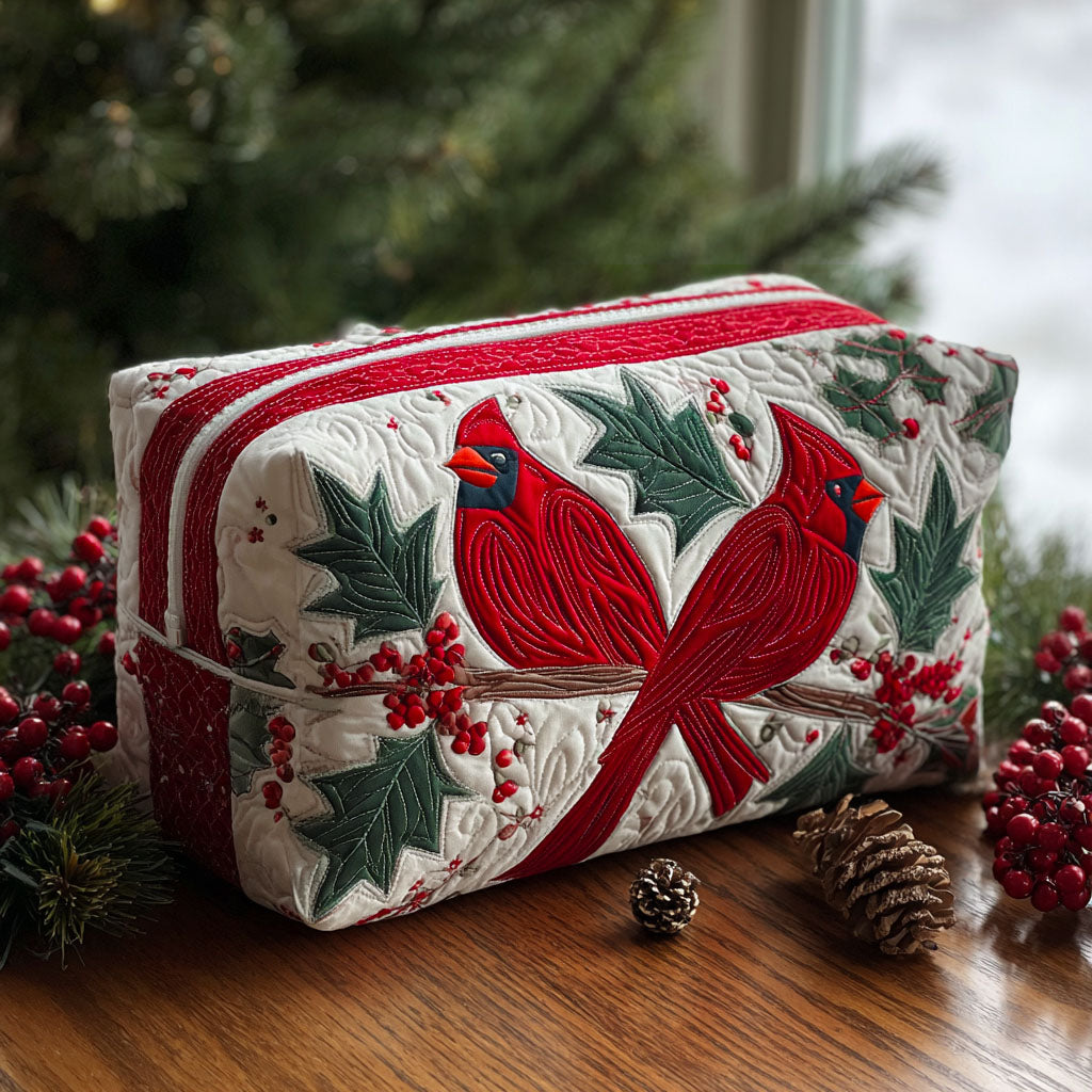 Crimson Song quilted make-up bag with red cardinals among holly leaves and berries on cream