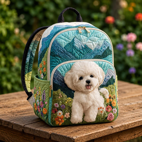 Artisan quilted backpack with a bichon frise before blue mountains and scattered flowers