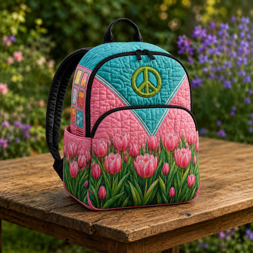 Artisan quilted backpack with hand-drawn tulips opening around a peace sign on a bright ground