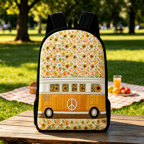 Artisan quilted backpack with a camper van printed amongst tall sunflowers in warm summer yellows and greens