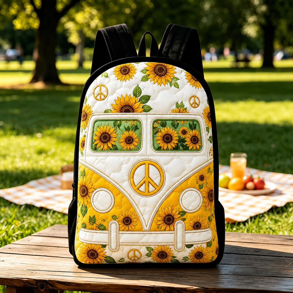 Artisan quilted backpack with a vintage camper van amongst sunflowers in warm golds, with black straps