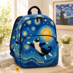 Artisan quilted backpack with a tuxedo cat in black and white against a blue background