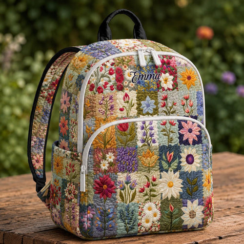 Artisan quilted backpack pieced from squares of flowered cotton in cottage-garden colours