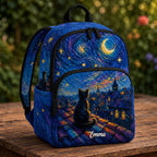 Artisan quilted backpack with a single cat against a swirling deep blue night sky with gold stars