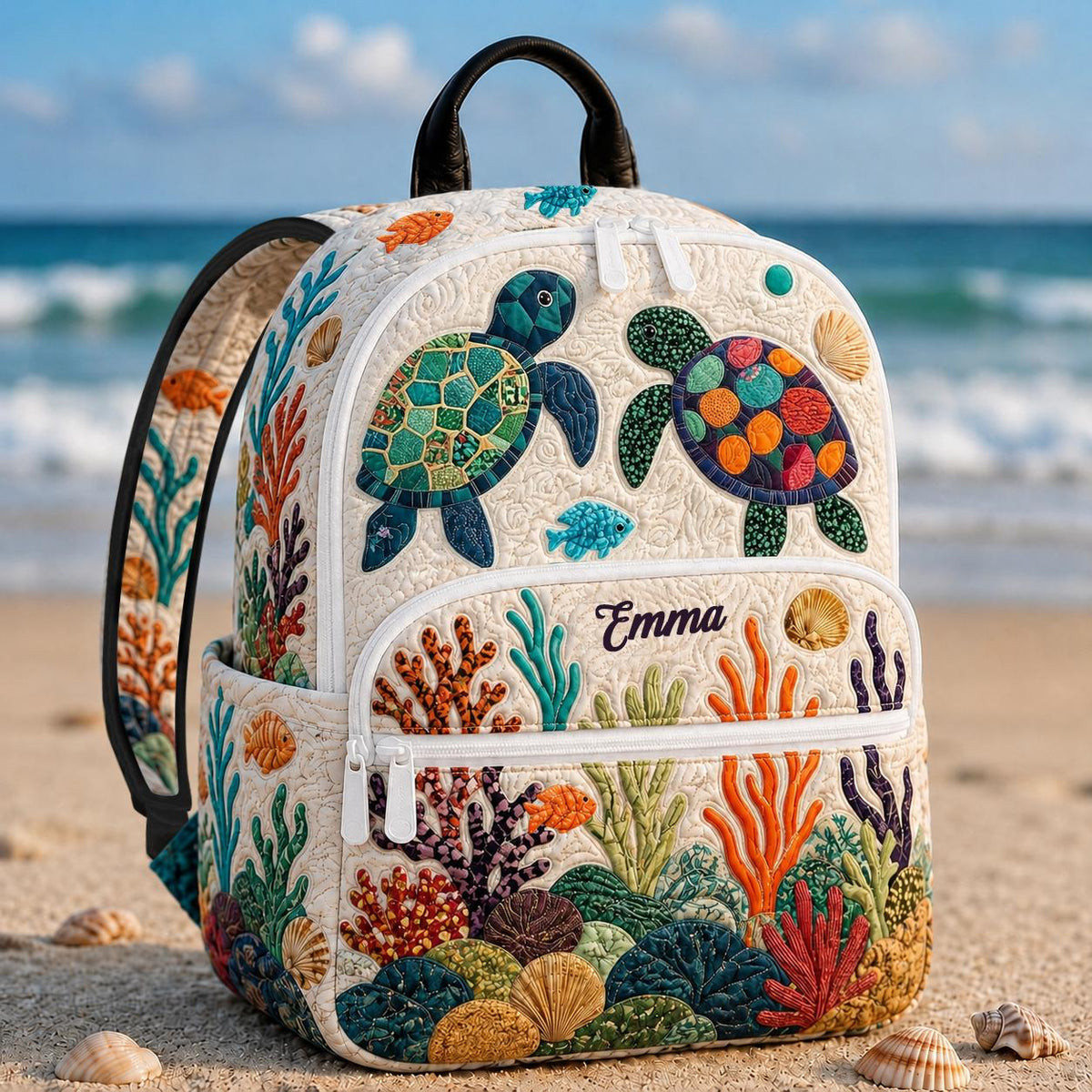 Artisan quilted backpack with an ocean life design of sea creatures drifting in blues and greens