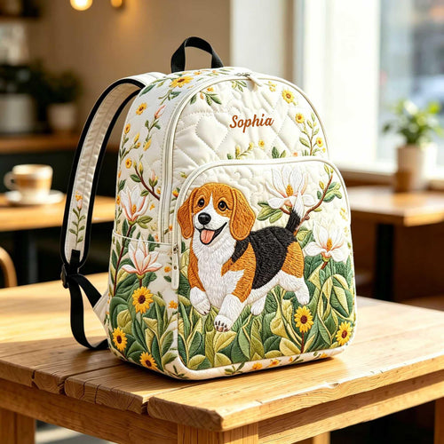 Artisan quilted backpack with a beagle puppy amongst open flowers and leaves, long ears and eyes turned up