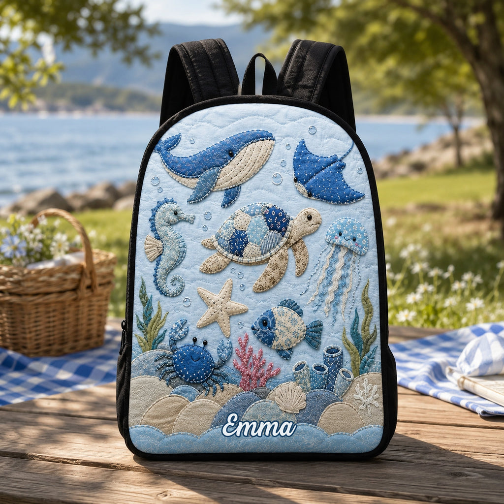 Artisan quilted backpack with an underwater scene of sea creatures amongst waves and weed in deep blues