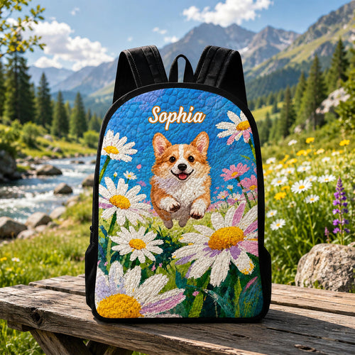 Artisan quilted backpack with a corgi sitting ears up amongst open flowers and green leaves