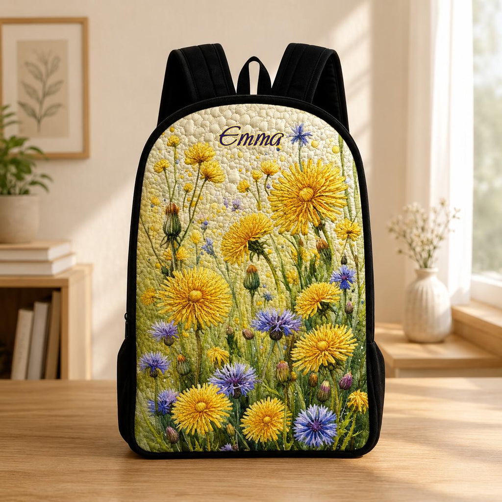 Artisan quilted backpack with a close-layered meadow of cottage-garden flowers and leaves across the whole bag