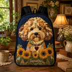 Artisan quilted backpack with a curly goldendoodle looking out from the front, framed by tall sunflowers