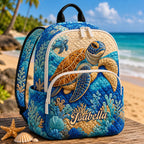 Artisan quilted backpack with a turtle swimming over a coral reef in blues and greens across the front