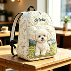 Artisan quilted backpack with a puppy sitting amongst soft painted blooms across the quilted front panel