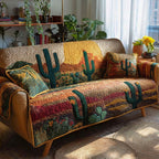 Cactus Sunset Hills quilted sofa cover – cacti on red and gold hills