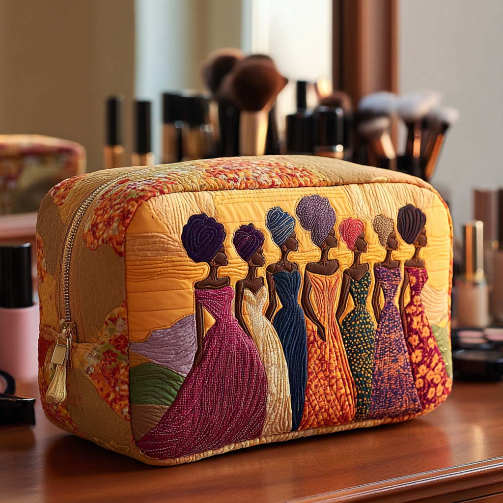 Elegant Queens quilted make-up bag with row of women in colourful gowns and head wraps on gold