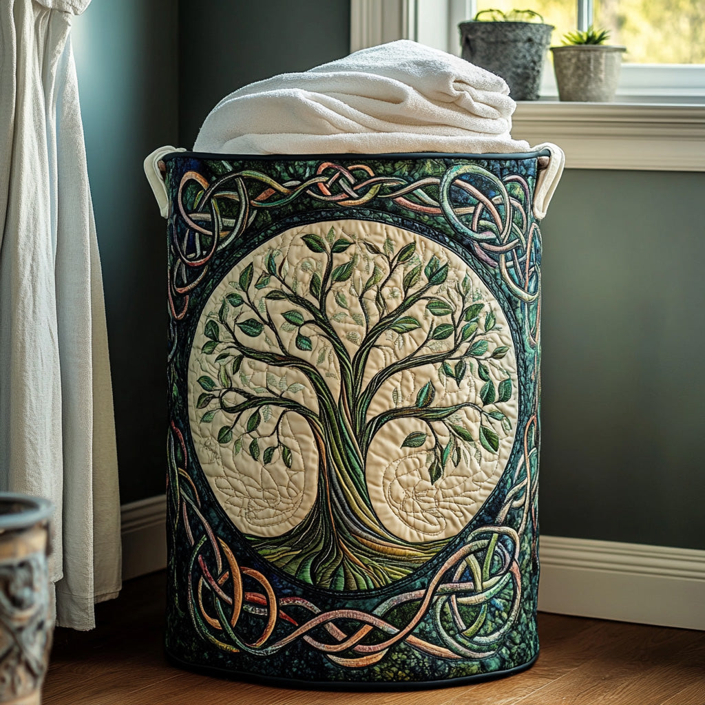 Quilted laundry basket with an Eternal Roots design of a slender circular tree in fine teal and gold lines with roots and branches meeting, with wave stitching and carry handles