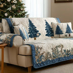 Frosted Blue Firs quilted sofa cover – blue fir trees on cream