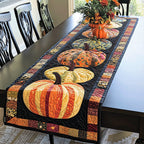 Striped Pumpkin Row quilted table runner – striped pumpkins on black