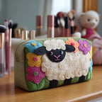 Floral Sheep quilted make-up bag with woolly sheep surrounded by colourful flowers