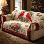 Cardinal Poinsettia quilted sofa cover – cardinals above a red poinsettia