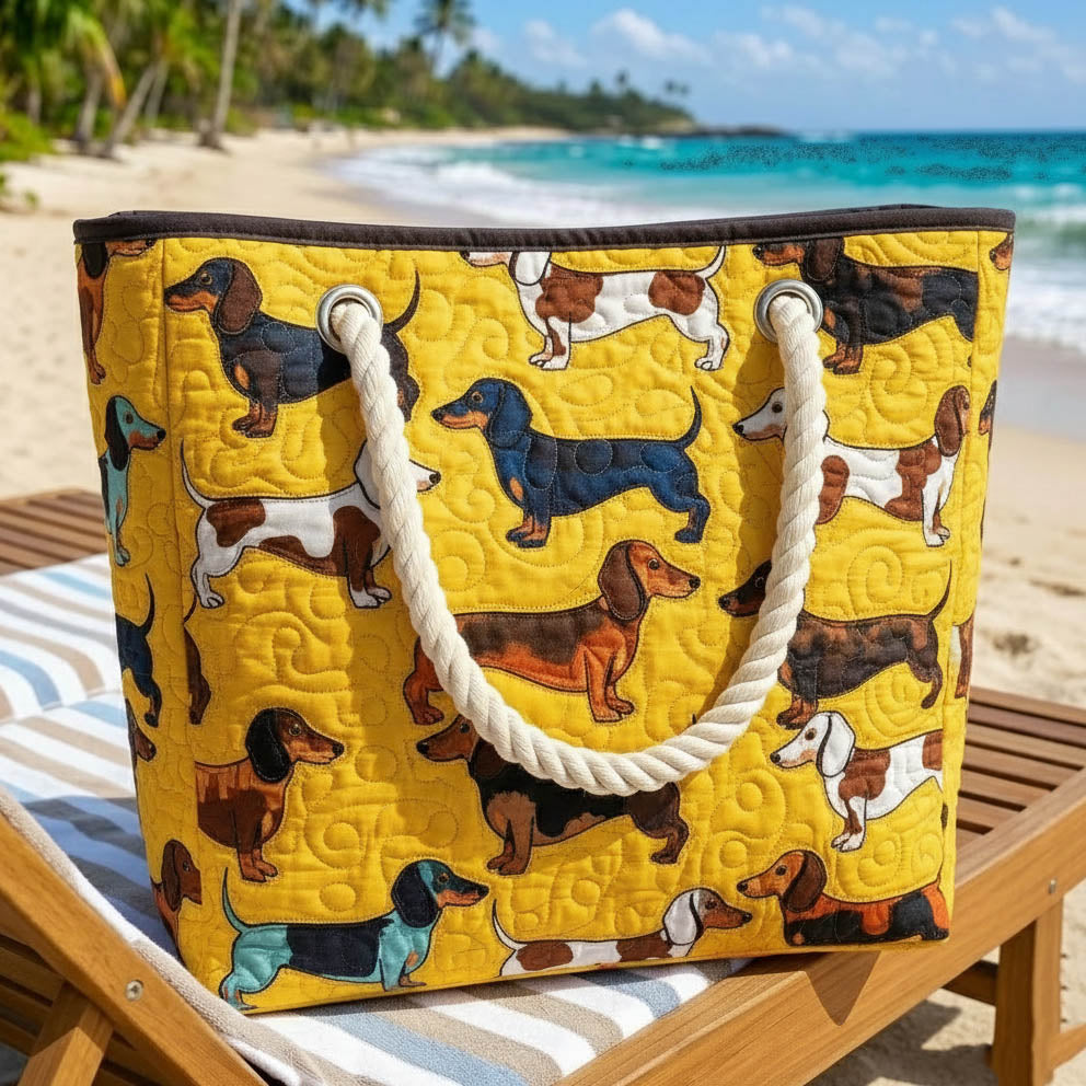 Quilted beach bag with the Dachshund design, long low dachshunds in tan, chocolate and black trotting across the front with ears swinging