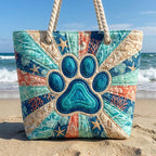 Quilted beach bag with the Paw Print design, rows of paw prints tracking across the quilted front