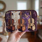 Violin Trio Swirl quilted purse – three violins on purple