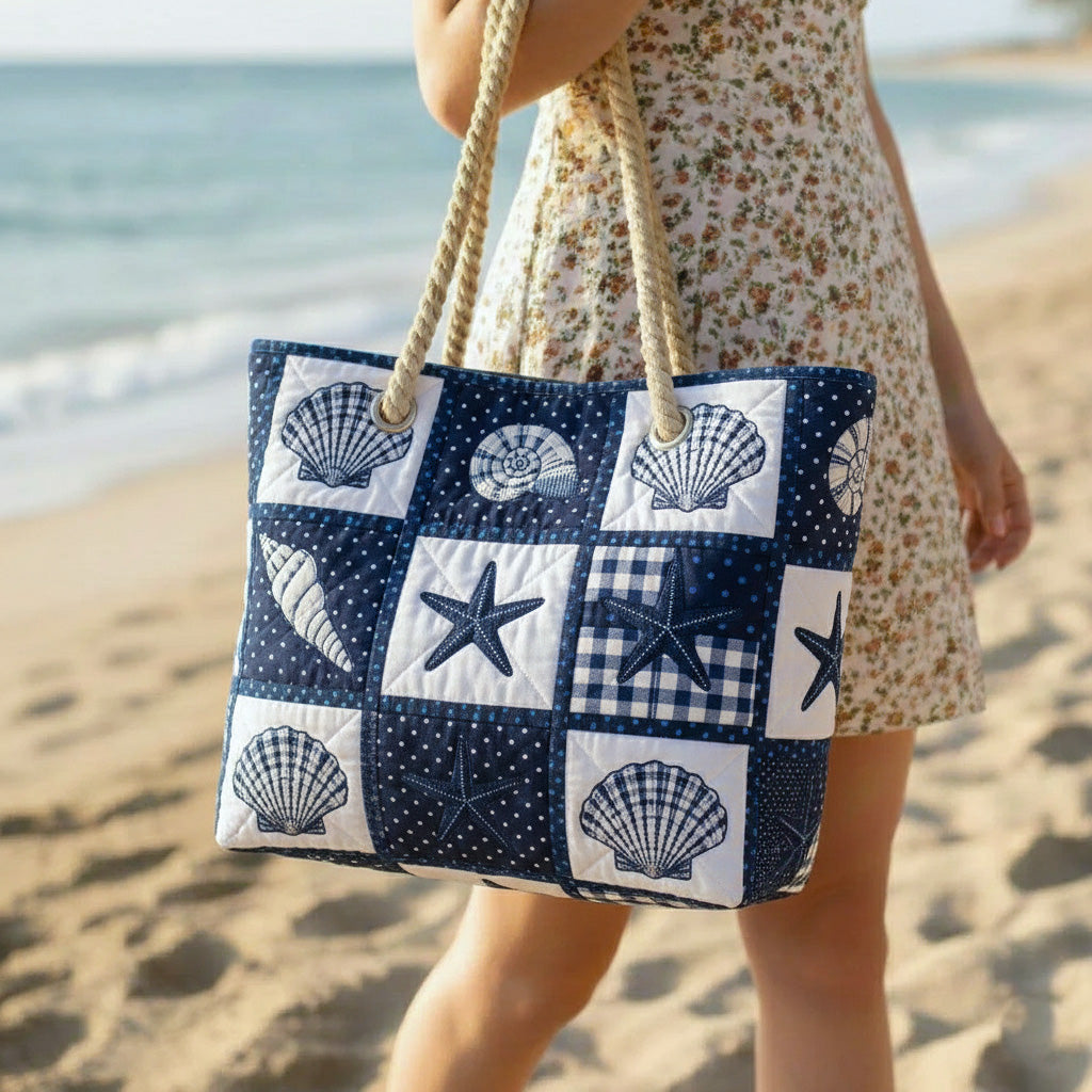 Woman carrying the Serenity of Shells quilted beach bag along the shore